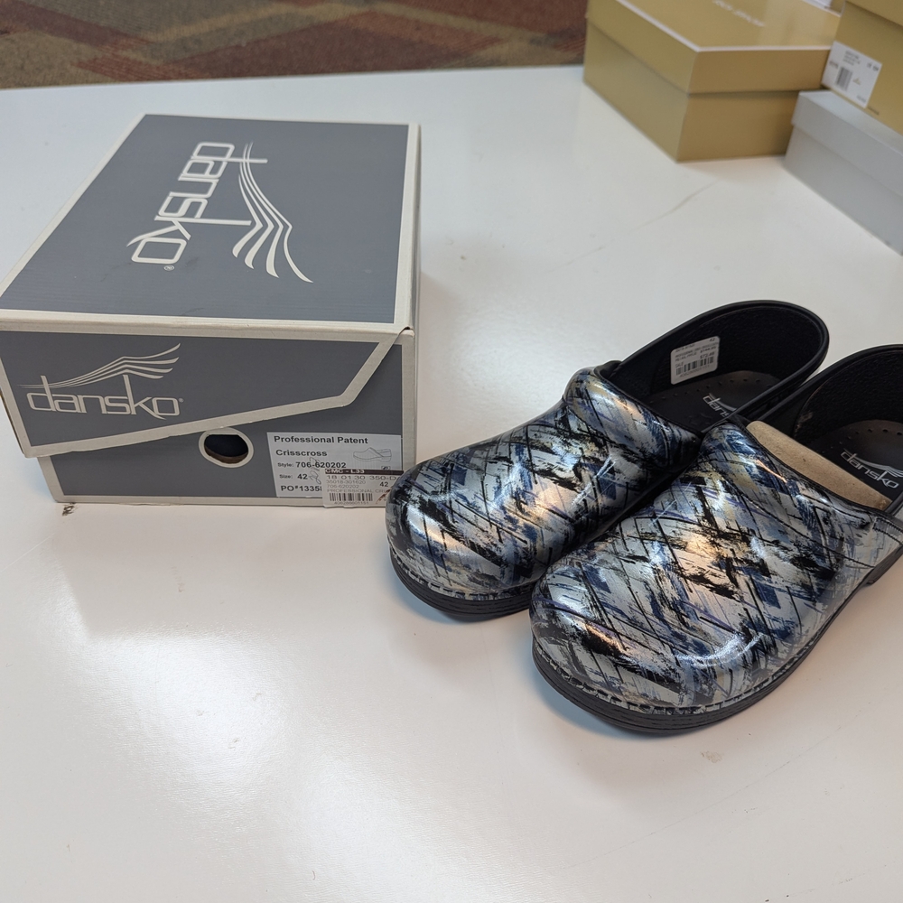 Dansko  Abstract Pattern Clogs- Black, White, and Blue